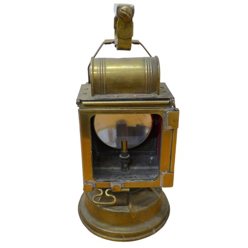 151 - A French brass railway lamp, early 20th century, 15.5 by 32cm high.