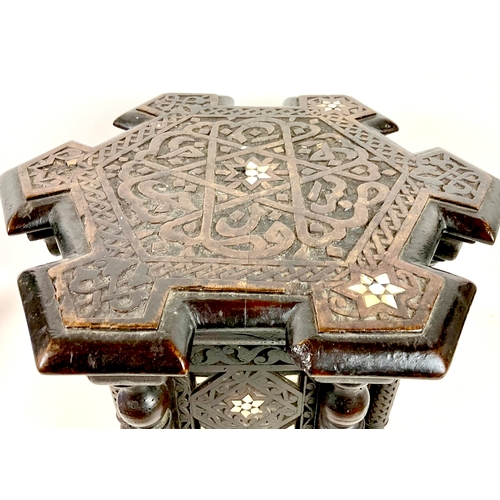 249 - A Persian hexagonal side table, low relief carved decoration inlaid with mother-of-pearl, 40 by 35 b... 