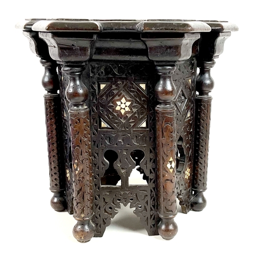 249 - A Persian hexagonal side table, low relief carved decoration inlaid with mother-of-pearl, 40 by 35 b... 