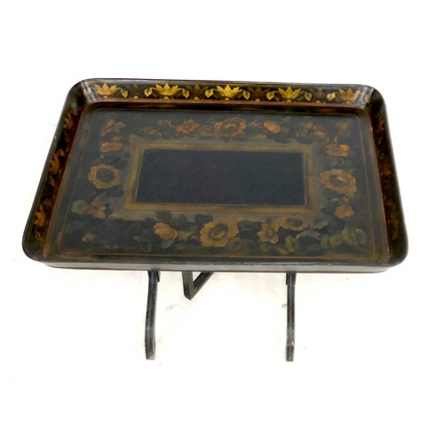 518 - A Victorian ebonised and gilt painted work tray top side table, the tray surface decorated with a fl... 