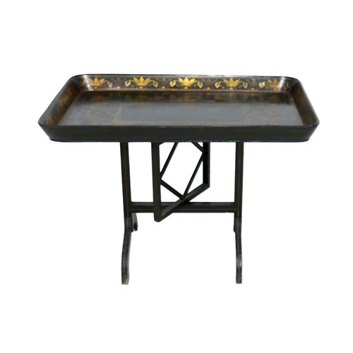 518 - A Victorian ebonised and gilt painted work tray top side table, the tray surface decorated with a fl... 