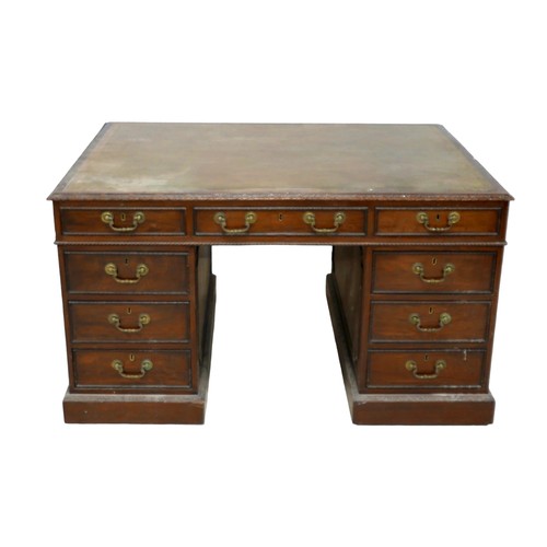 548 - An Edwardian mahogany twin pedestal partners desk, with a leather inset top above nine drawers, oppo... 