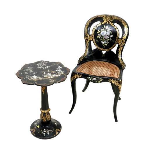 550 - A Victorian ebonised side chair, inlaid with mother of pearl and decorated with scrolling gilt borde... 