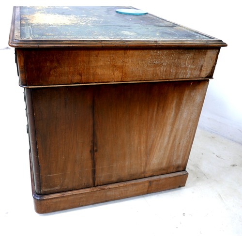 564 - A late Victorian walnut nine drawer twin pedestal writing desk, 137 by 75 by 75cm high.

Provenance:... 