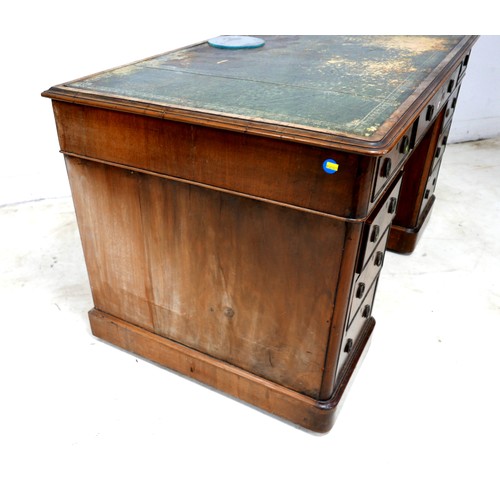 564 - A late Victorian walnut nine drawer twin pedestal writing desk, 137 by 75 by 75cm high.

Provenance:... 