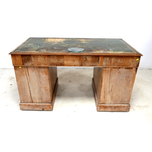 564 - A late Victorian walnut nine drawer twin pedestal writing desk, 137 by 75 by 75cm high.

Provenance:... 