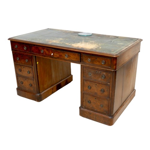 564 - A late Victorian walnut nine drawer twin pedestal writing desk, 137 by 75 by 75cm high.

Provenance:... 