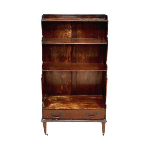 565 - An Edwardian mahogany waterfall bookcase, with a drawer to base, 62 by 31 by 117cm high.

Provenance... 