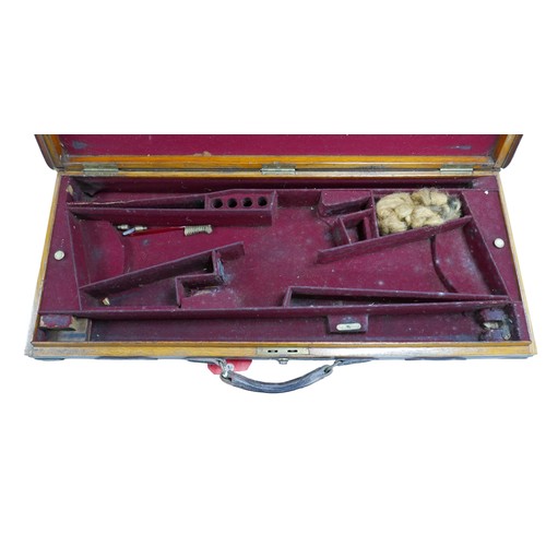 318 - A good quality oak lined leather double shotgun/rifle gun case by Boss & Co London, 85 by 36 by 10cm... 