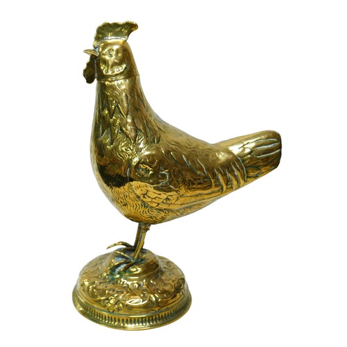 343 - An embossed brass Cockerel on stand, with lift off head, 20cm by 32cm high.

Provenance: Privately o... 