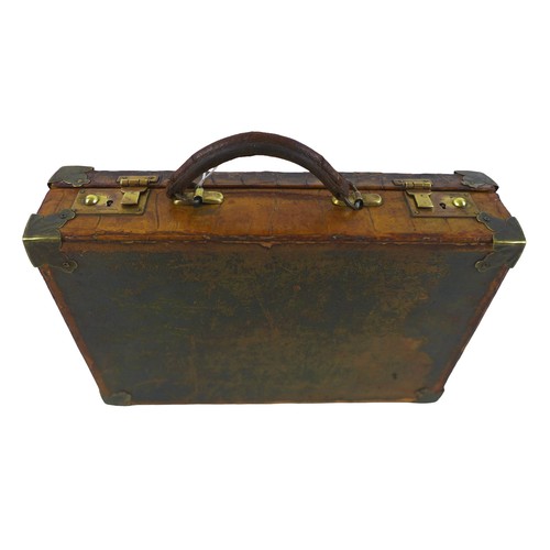 312 - An early 1900s crocodile attache case with a fitted interior, 36cm by 23cm by 9.5cm tall