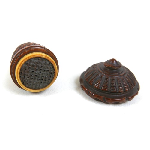 256 - A 19th century carved treen nutmeg grater and a treen eggcup, the grater measures 4.5cm by 6.5cm and... 