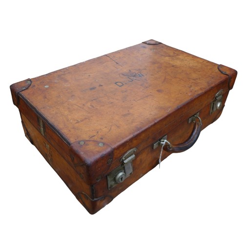 314 - A good quality early 1900's tan leather suitcase by Drew and Sons Piccadilly Circus London, 61 by 38... 