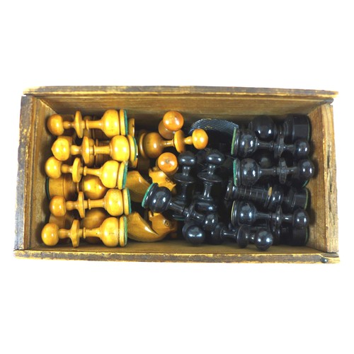 257 - A late 19th century ebony and boxwood weighted chess set, King and Queen both 9cm high.