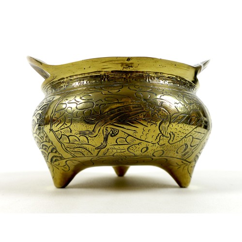 2 - A large Chinese Ming period style polished bronze censer, squat circular form with twin handles, dec... 