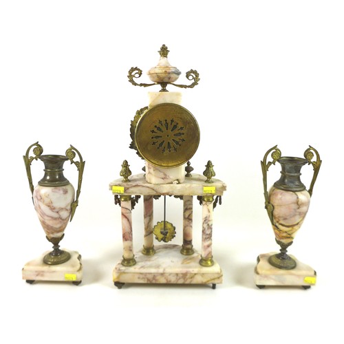 228 - A French pink marble portico clock garniture set, the clock 44cm tall, striking on a bell.