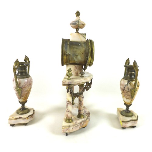 228 - A French pink marble portico clock garniture set, the clock 44cm tall, striking on a bell.