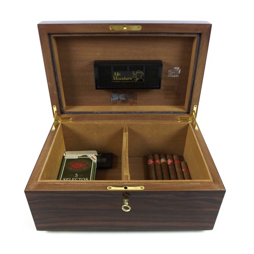 258 - An exotic wood humidor, with key, 35 by 23 by 18cm high, containing four J. Cano Selectos sealed cig... 