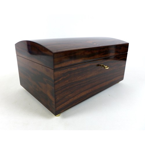 258 - An exotic wood humidor, with key, 35 by 23 by 18cm high, containing four J. Cano Selectos sealed cig... 