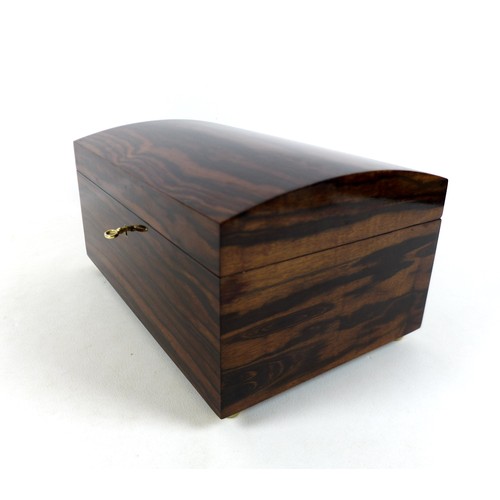 258 - An exotic wood humidor, with key, 35 by 23 by 18cm high, containing four J. Cano Selectos sealed cig... 