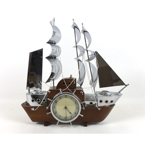 226 - An Art Deco Chrome and wood three mast sailing ship clock lamp, 45 by 44cm, with electric Metamec mo... 