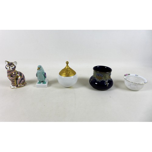 187 - Five pieces of collectable china, to include a Royal Doulton vase 9cm tall, a Herand Penguin and dis... 