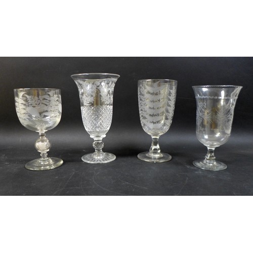 68 - A group of four clear glass 19th century presentation vases / goblets, comprising one celery vase wi... 