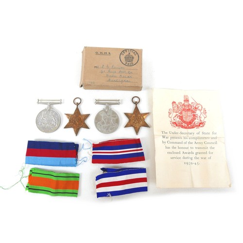 278 - A group of four WWII medals awarded to L. C. Lawson, comprising 1939-45 Star, France & Germany Star,... 