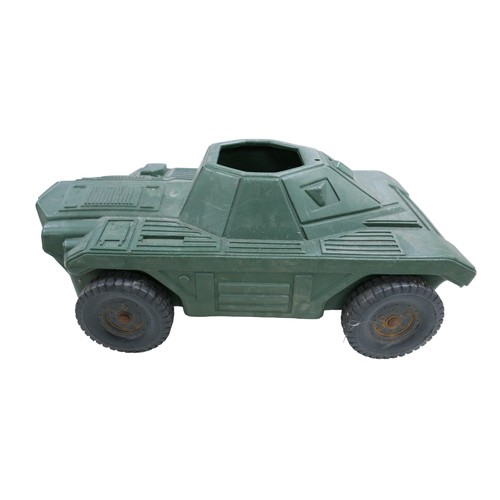 265 - An Action Man armoured car, figure, stamped to rear with 'G.I Joe 1964', accessories, including clot... 