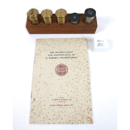 236 - A Charley Perry of London microscope with mahogany case and accessories.