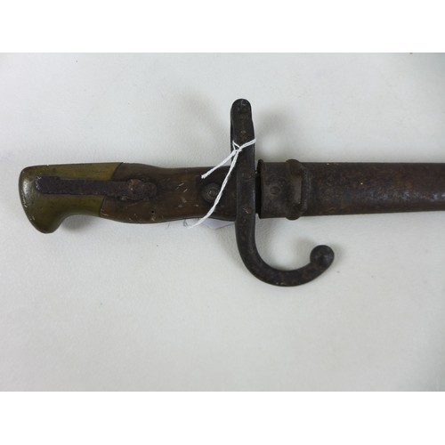 277 - A French model 1874 bayonet with scabbard, blade 51.5cm.