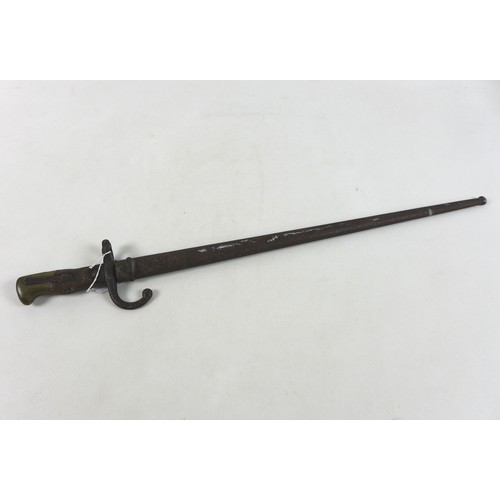 277 - A French model 1874 bayonet with scabbard, blade 51.5cm.