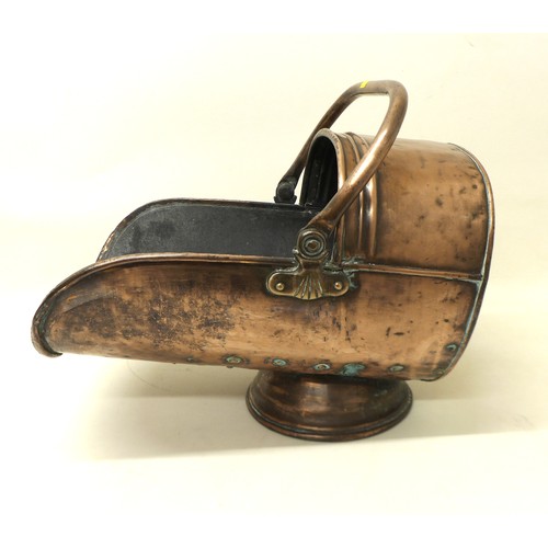 341 - A Victorian helmet shaped coal scuttle, 48cm long.