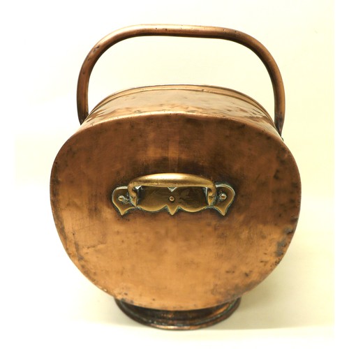 341 - A Victorian helmet shaped coal scuttle, 48cm long.