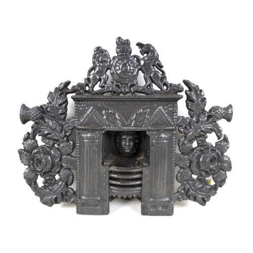 339 - A 19th century Scottish miniature cast iron fireplace in the style of Greenless of Glasgow 34cm by 2... 