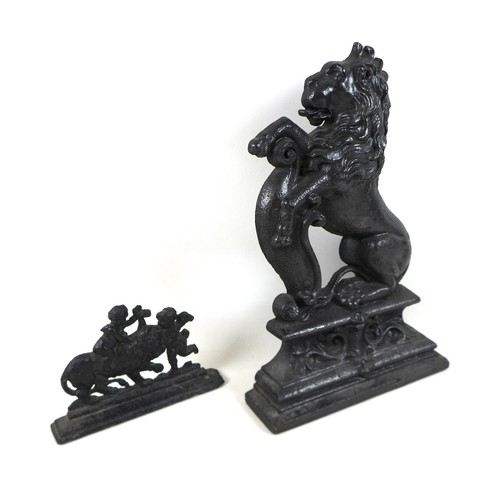 337 - A 19th century cast-iron figure of a rampant lion, 26cm by 39cm, and a smaller cast-iron group, 20cm... 