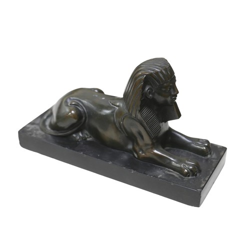 118 - A 19th century grand tour style bronze of sphinx, unsigned, raised upon a marble plinth, 20.3 by 8.2... 