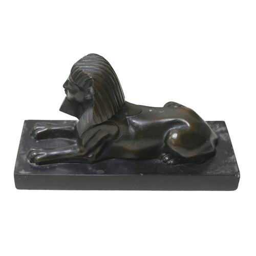 118 - A 19th century grand tour style bronze of sphinx, unsigned, raised upon a marble plinth, 20.3 by 8.2... 