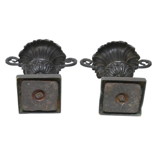 119 - A pair of 19th century neo-classical bronze urn garnitures, with weighted bases, each 15.5 by10 by 1... 