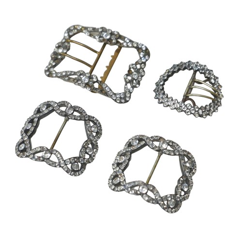 166 - A group of four 19th century buckles, including one pair of white metal, each 5.5 by 5 by 1.5cm, tog... 