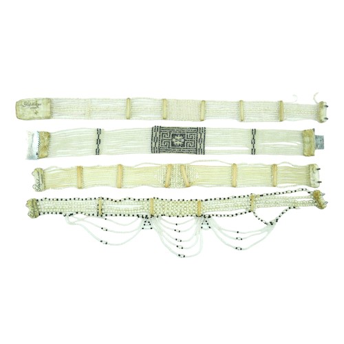 292 - Four early 20th century chokers, comprising one with a white metal clasp inlaid with marcasites, 33c... 