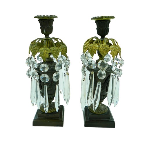 168 - A pair of continental bronze table lustres, of urn form with gilt metal mounts, glass drops, raised ... 