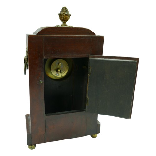 223 - A Regency cased mahogany mantel clock, with brass inlays, ormolu mounts, Roman numeral dial, later m... 