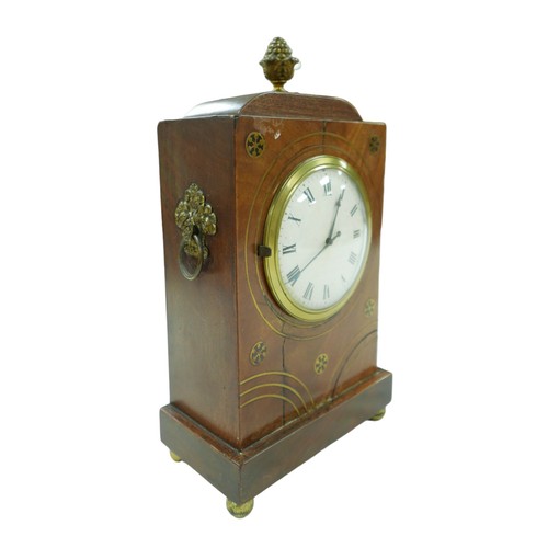 223 - A Regency cased mahogany mantel clock, with brass inlays, ormolu mounts, Roman numeral dial, later m... 