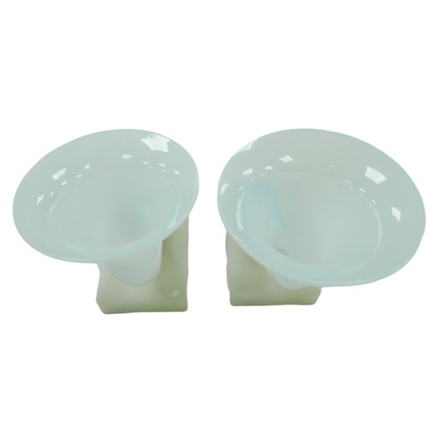 71 - A pair of early 20th century milk glass cornucopias, with ormolu hand terminals, raised upon marbles... 