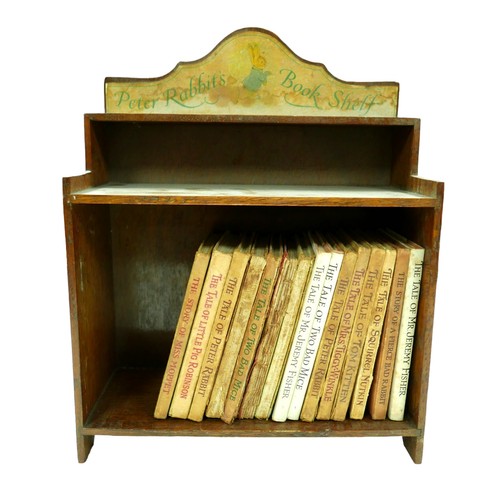 191 - A Peter Rabbit bookcase with fifteen Beatrix Potter children's stories, including The Tale of Peter ... 