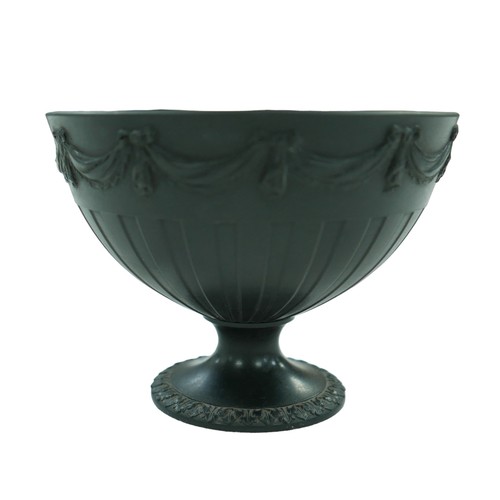 93 - A pair of 19th century Wedgwood basalt bowls, each decorated with swags above a fluted body, raised ... 