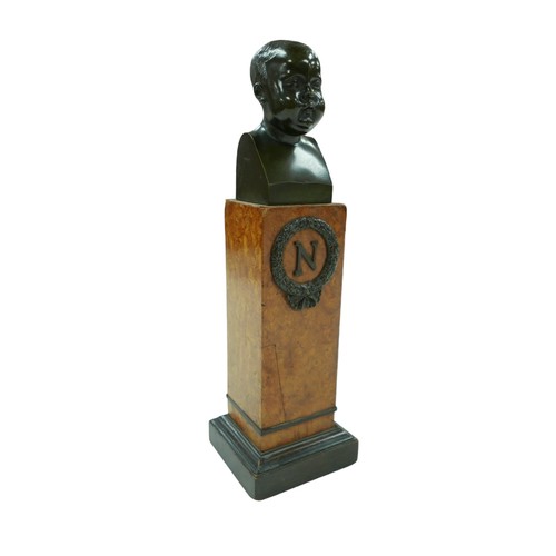 120 - A 19th century miniature bronze bust of the infant son of Napoleon Bonaparte, the bust, unsigned, ra... 