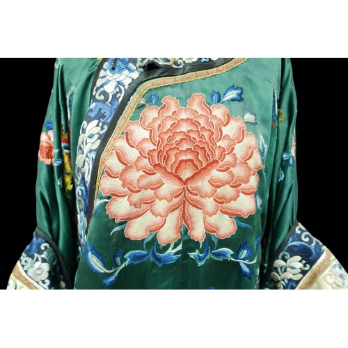 307 - An early 20th century Japanese silk kimono, decorated with chrysanthemums, roses and butterflies on ... 