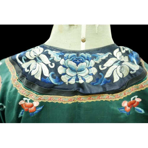 307 - An early 20th century Japanese silk kimono, decorated with chrysanthemums, roses and butterflies on ... 